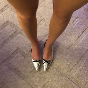 Prada silver pointed toe flats with bow